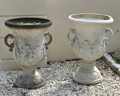 PAIR OF LARGE CLASSICAL GARDEN URNS: The Classical garden urns with scroll form handles and acanthus leaf decorated bodies on circular acanthus leaf decorated raised foot. Cast polymer imitating limestone. Height 32" Diameter 21 1/2"