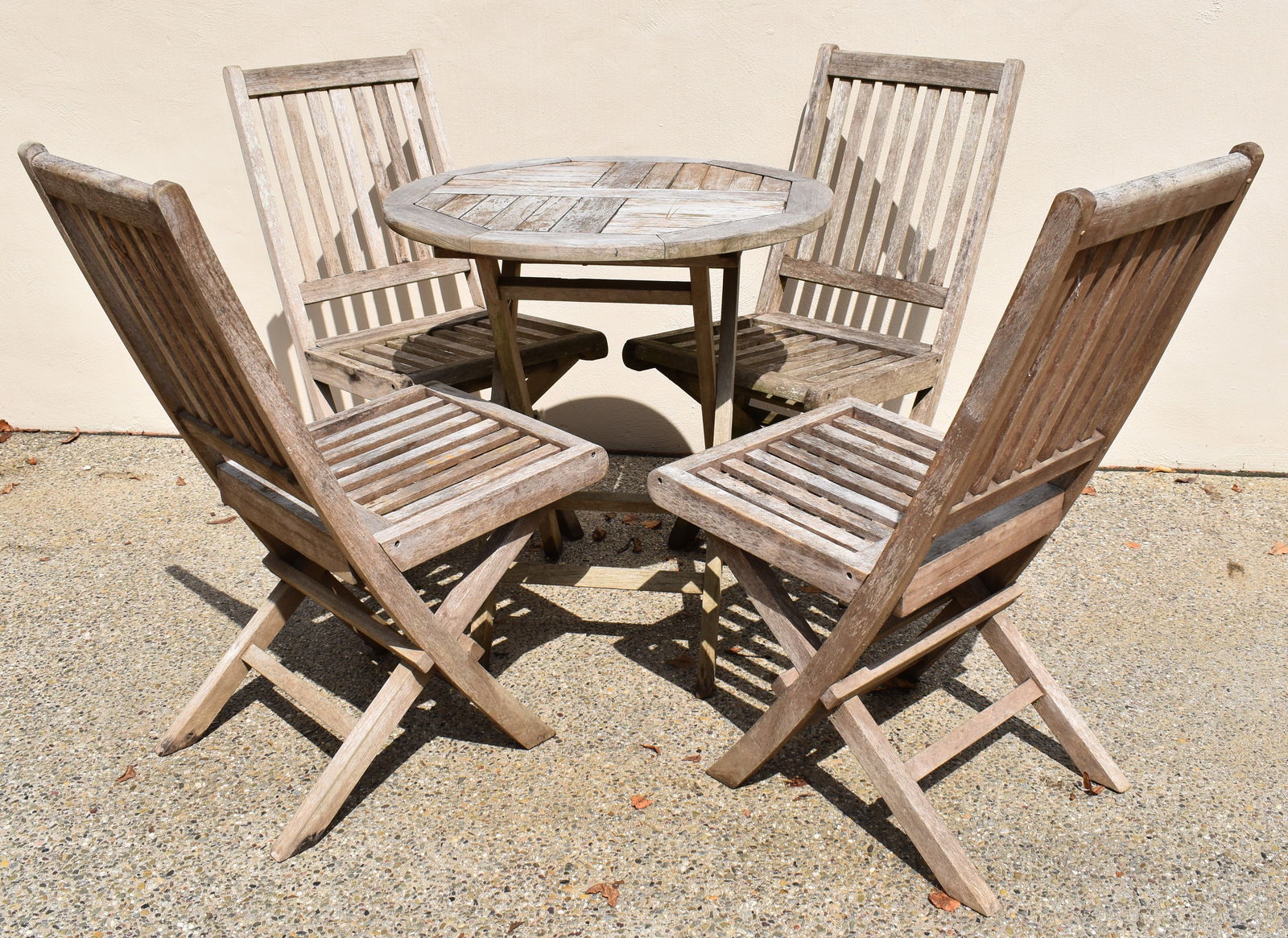 FINE TEAK FOLDING TABLE AND FOUR SIDE CHAIRS (1 of 2)