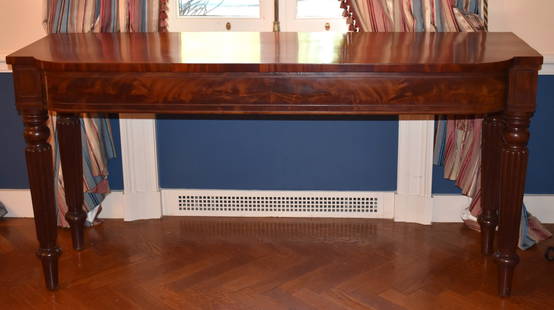 GEORGE III MAHOGANY SERVING TABLE ATTR. TO GILLOWS: This exceptional early 19th century Sheraton mahogany serving table is attributed to Gillows. The table is constructed from the finest quality colored and figured mahogany. The shaped rectangular top