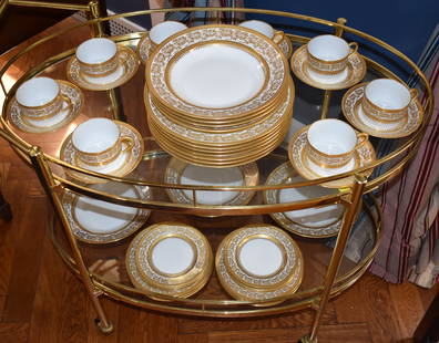 CH. FIELD HAVILAND LIMOGES PARTIAL DINNER SERVICE: Of very fine quality, the white porcelain body with extensive gilt vintage decorated borders. The set consists of 7 dinner plates, 8 soup dishes, 8 salad plates, 8 bread plates, 8 cups & saucers.