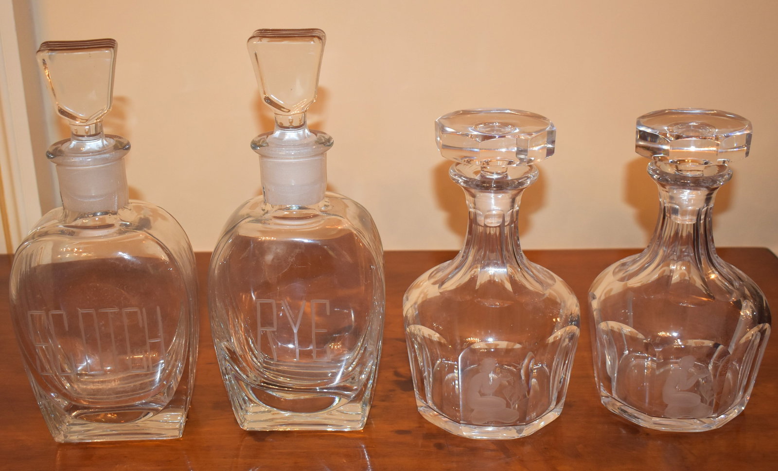 FOUR LEAD CRYSTAL DECANTERS (1 of 2)