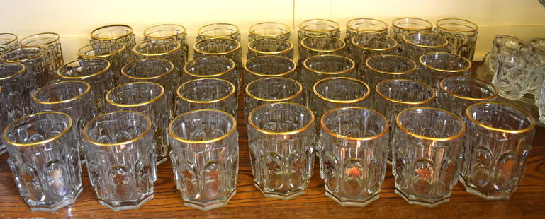 36 BACCARAT CHARLES X DESIGN CRYSTAL GLASSES: The hexagonal glasses with raised oval reserves with gilt vintage decoration. Height 4 1/4" Diameter 3 1/4"