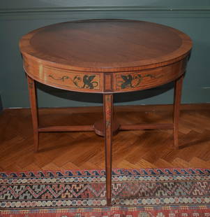 EDWARDIAN MAHOGANY & SATINWOOD CENTER TABLE: Having gilded and floral hand painted decoration with cross stretchers. Height 28 1/2" Diameter 34"