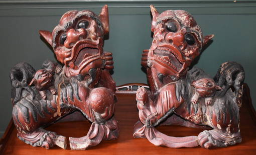 PAIR OF CHINESE CARVED WOOD RED LAQUER FOO DOGS: Height 17 1/2" Width 14"