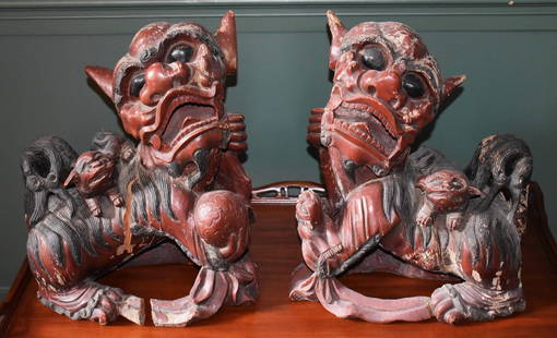 PAIR OF CHINESE CARVED WOOD RED LAQUER FOO DOGS: Height 17 1/2" Width 14"