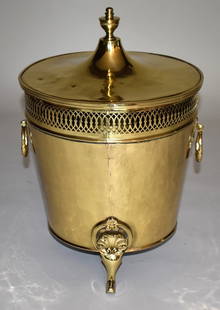 19TH CENTURY DUTCH BRASS COAL HOD & COVER: Having urn finial, the cylindrical dovetailed body with reticulated rim and openwork ring carrying handles and shell formed pad feet Finely polished. Height 20"