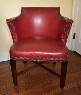 CHIPPENDALE STYLE BENCH MADE RED LEATHER ARMCHAIR: The armchair bench made of mahogany with fine red leather upholstery ornamented with brass nails, square molded legs connected by cross stretcher. A quality chair in fine condition. Height 30 1/2" Pro