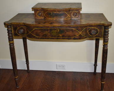 NEW ENGLAND SHERATON PAINTED PINE DRESSING TABLE: The table retaining its original floral and yellow pinstripping on a sponge decorated ground. Backboard behind upper drawer replaced. Height 35" Width 38 1/2" Depth 16"