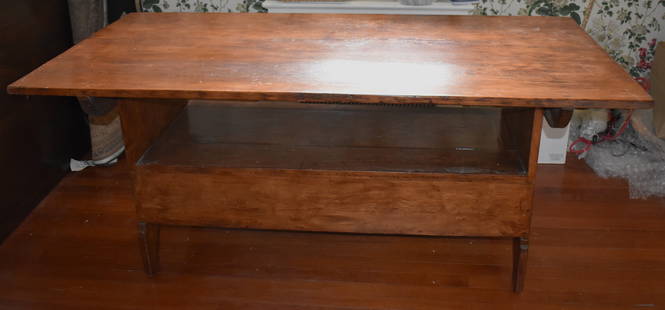 LARGE ANTIQUE AMERICAN COUNTRY PINE BENCH TABLE: The country pine bench table with large rectangular tilting top, the bench with hinged lift lid all on bootjack ends. Height 30" Width 71" Depth 35"