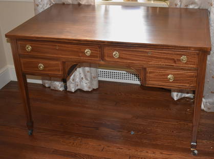 AMERICAN HEPPLEWHITE STYLE MAHOGANY PARTNER'S DESK: The partner's desk with rectangular top above two over two drawers with arched kneehole center raised on square tapering legs with spade feet. All with lightwood line inlay. Height 30 1/2" Width 48" D