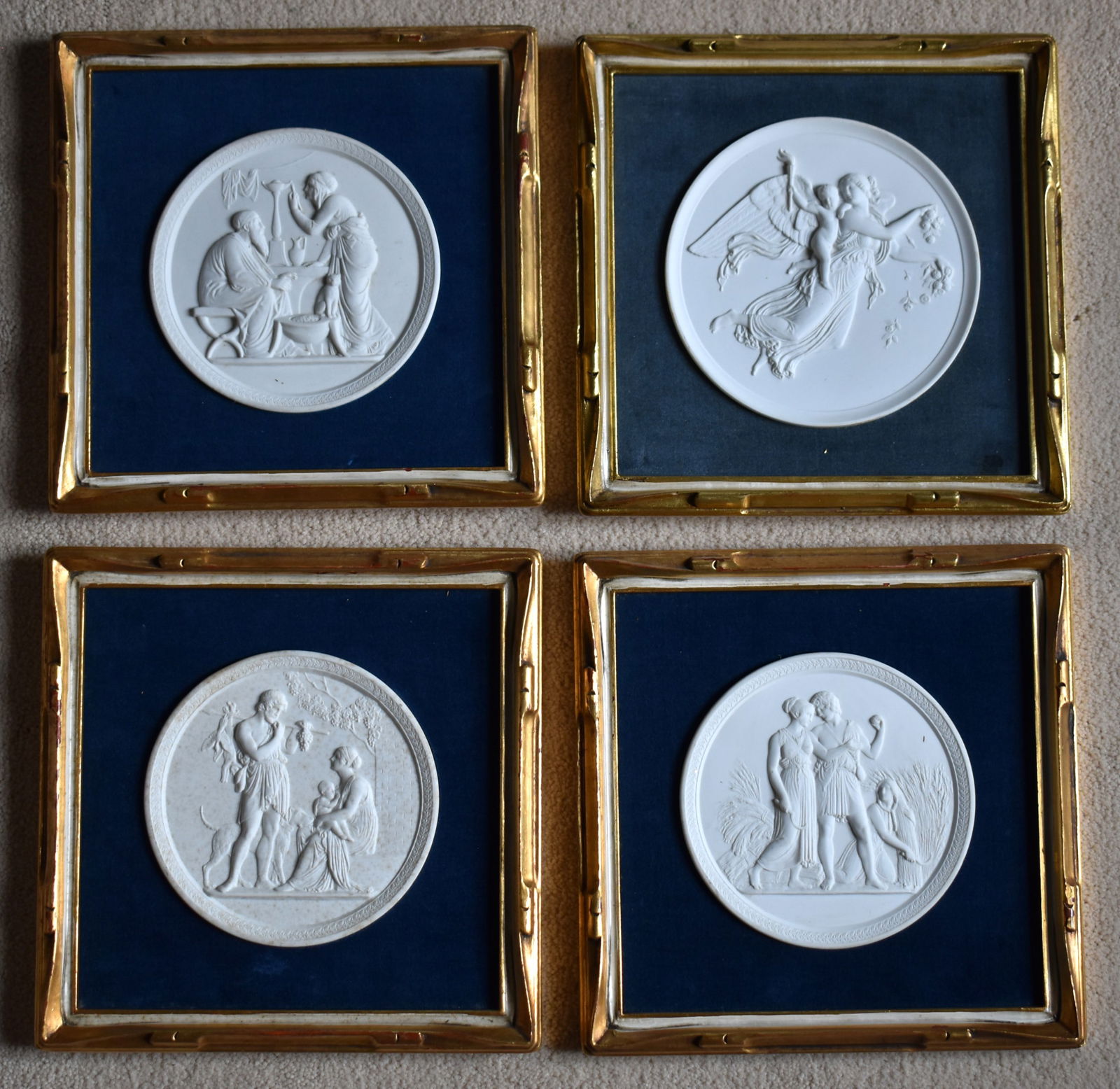 FOUR BISCUIT PORCELAIN CLASSICAL RONDELS (1 of 1)