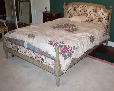 FINE LOUIS XVI FRENCH CRÃˆME PAINTED BED: The Louis XVI bed in crÃ¨me paint with floral upholstered headboard with carved arched crest and reeded and carved artichoke topped posts with conforming front posts and original hand carved rails.