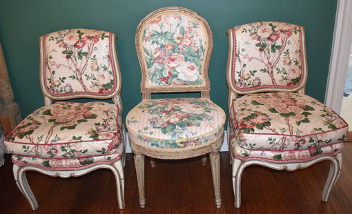 LOT OF 3 FRENCH CHAIRS, 2 SLIPPER CHAIRS & SIDECHAIR: The pair of Louis XV style slipper chairs in crème paint with gilt highlights with upholstered backs and removable cushion seats along with a Louis XVI sidechair with upholstered back and seat on f
