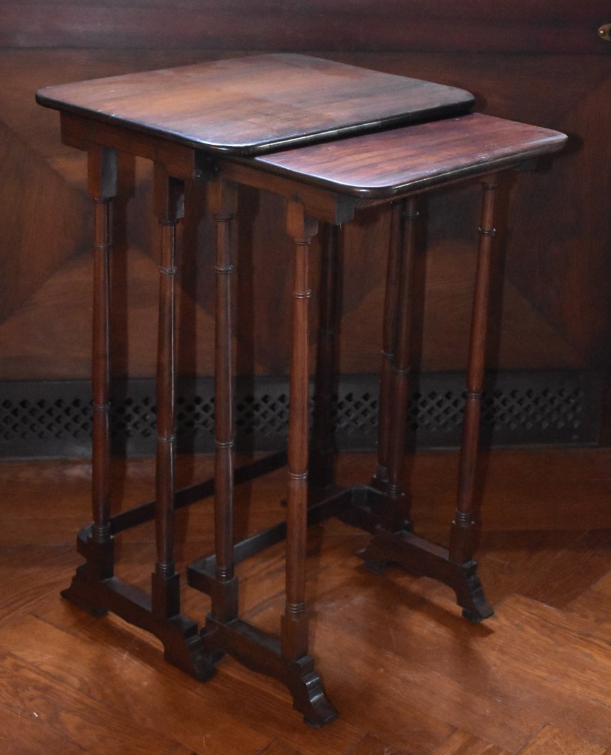 TWO GRADUATED REGENCY NESTING ROSEWOOD TABLES: Height 26 3/4" Top 14 1/8" x 17 1/4"