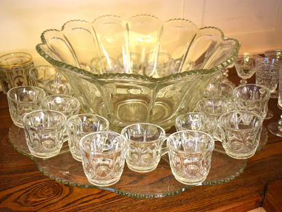 MONUMENTAL PRESSED GLASS PUNCH SET: Consisting of 22 pieces with large punch bowl and undertray and 20 punch cups. Bowl Diameter 14 1/2" Undertray Diameter 21"