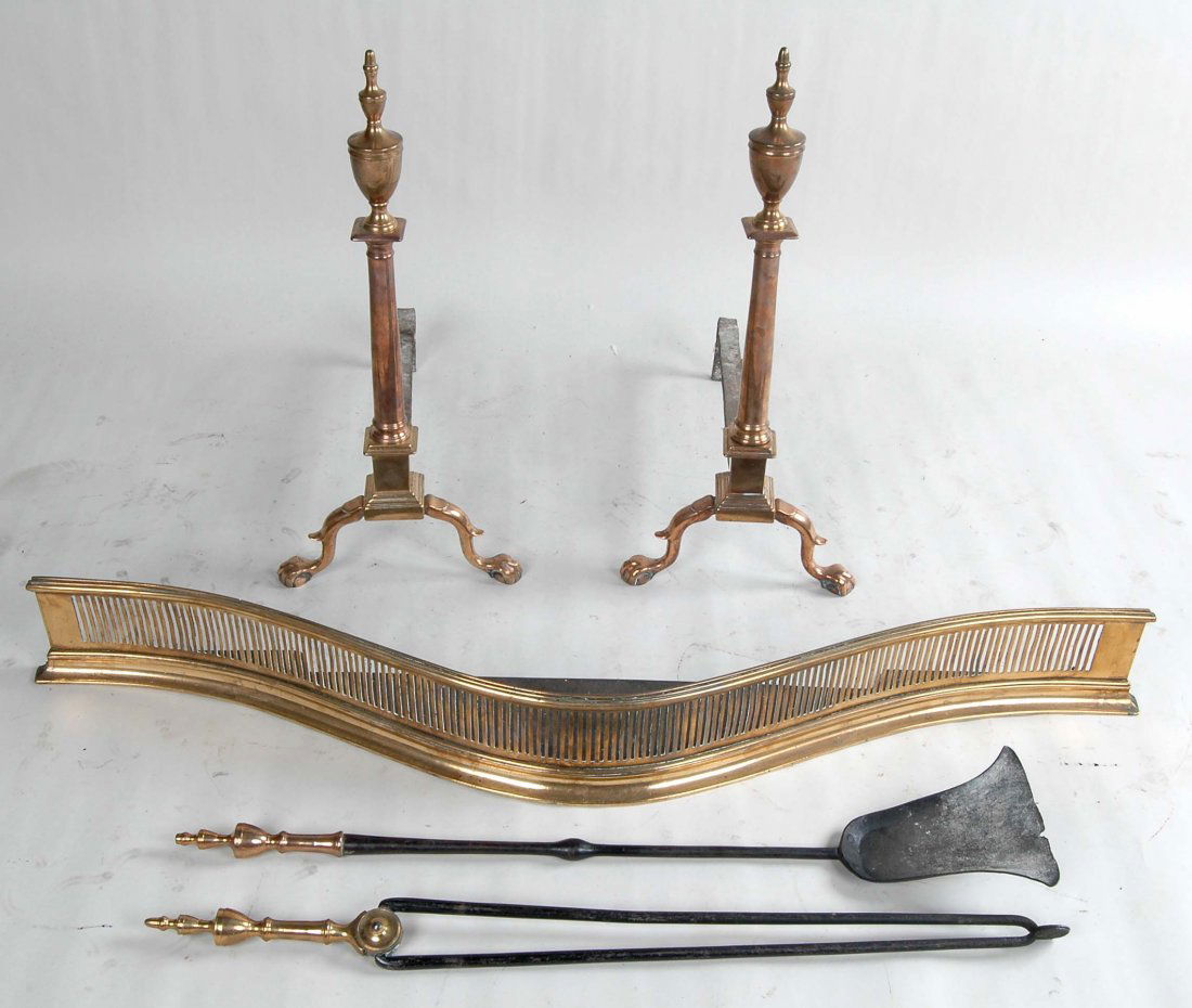 RARE 18TH C. PHILA. BELL METAL FIREPLACE SET: All in matching bell metal including an exceptional pair of large Chippendale urn top ball and claw foot andirons, rare serpentine reticulated cast bell metalfire fender, & matching urn top shovel & t