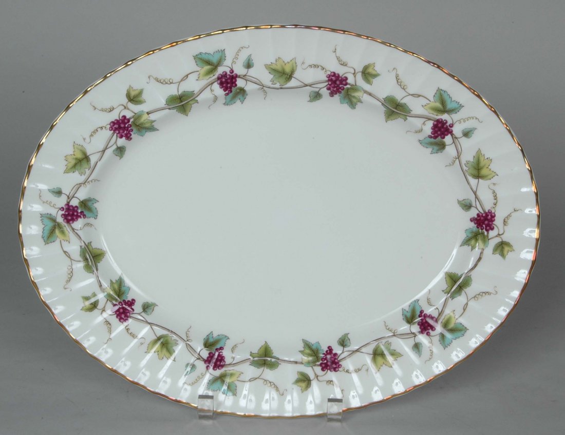 ROYAL WORCESTER PORCELAIN DINNER SET: Bachannal Pattern, Like new condition consisting of: 12 dinner plates, 12 luncheon, 12 salads, 18 low bowls, 18 cups and saucers, 14 demitasse cups, 11 demitasse saucers, 12 bouillons w/underplates, 1