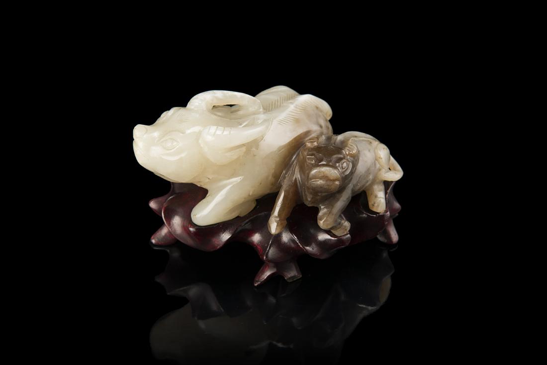A pale-green and brown jade "buffalo group" (1 of 1)