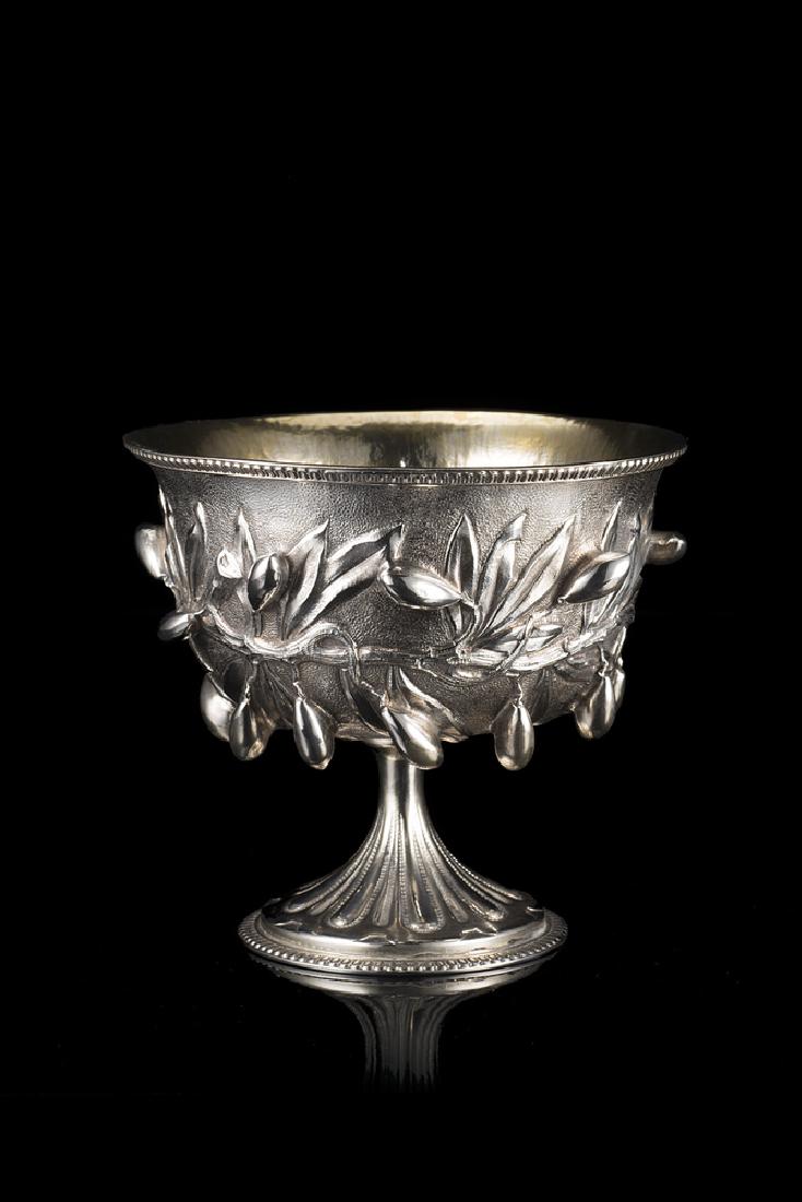 A silver bowl. Milan, 20th century. Silversmith Mario: A silver bowl. Milan, 20th century. Silversmith Mario Poli (h. cm 15; d. cm 17,2) (gr 540 ca.) (minor defects)