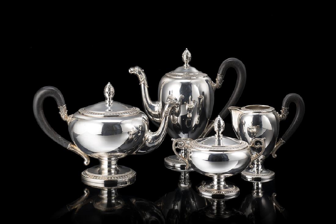 A silver tea and coffee set. Alessandria, mid 20th: A silver tea and coffee set. Alessandria, mid 20th century (h. coffeepot cm 20,5) (gr tot 1600 ca.) (minor defects)