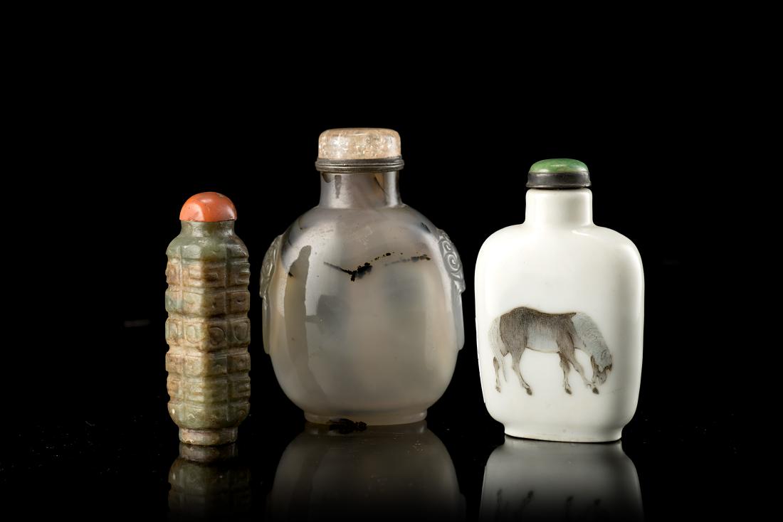 Three snuff bottles: the first made of porcelain with (1 of 1)