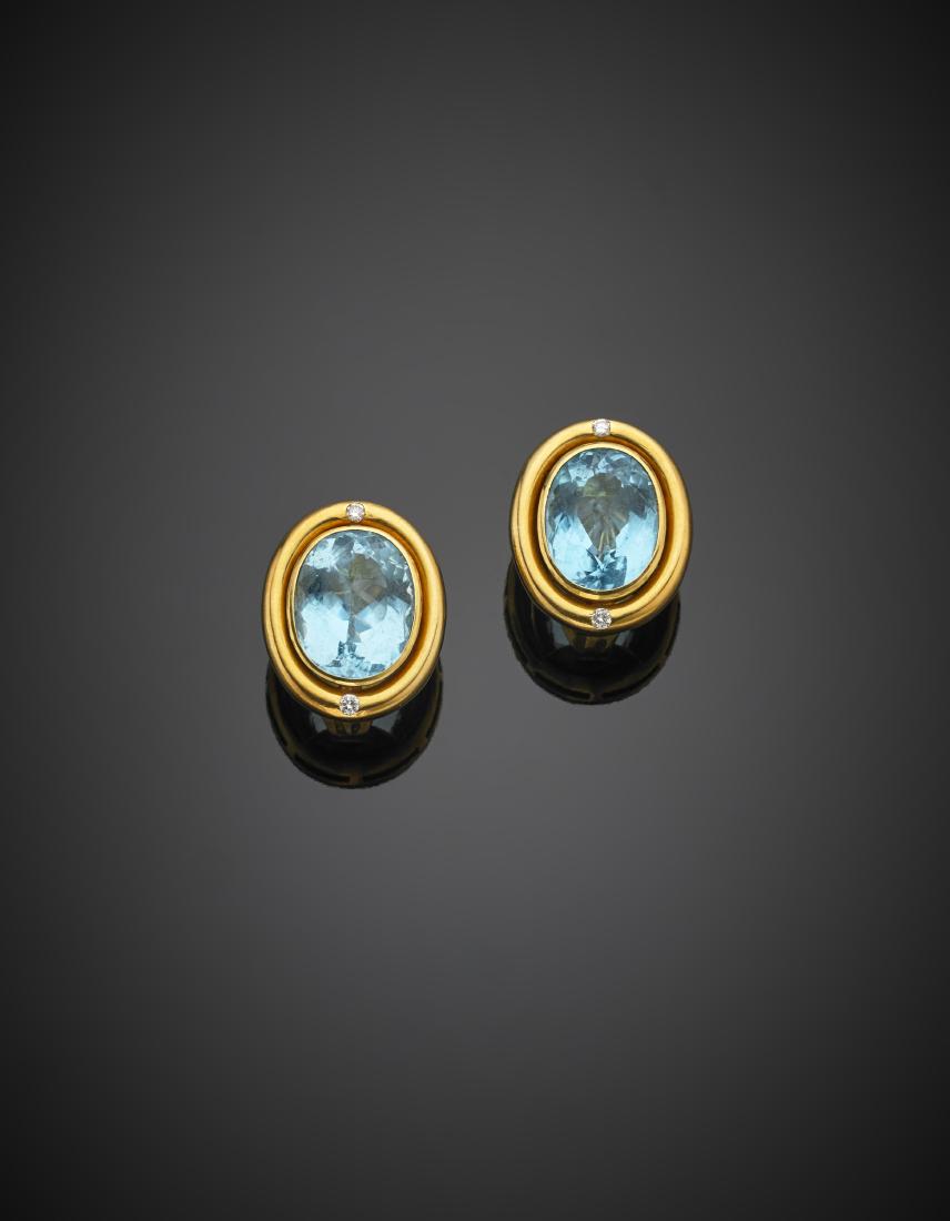 Oval blue topaz and diamond, in all ct. circa yellow: Oval blue topaz and diamond, in all ct. circa yellow gold earrings, g 24.66.Orecchini in oro giallo con topazi azzurri ovali per complessivi ct. circa, rifiniti con diamanti, g 24,66.