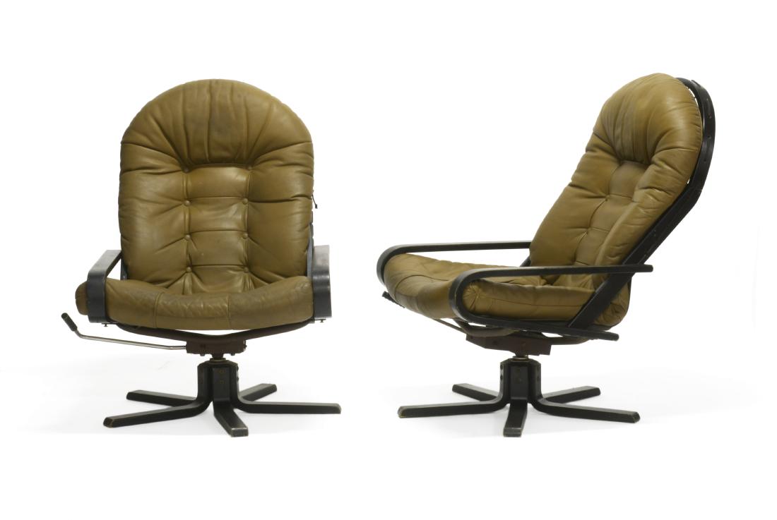 Sigurd Ressel (Meldal 1920 - Møre og Romsdal: Sigurd Ressel (Meldal 1920 - Møre og Romsdal 2010)(Attributed)Pair of armchairs with multi-layered curved black painted wood structure, padded seat and seatback cladded in brown leather. Produced by