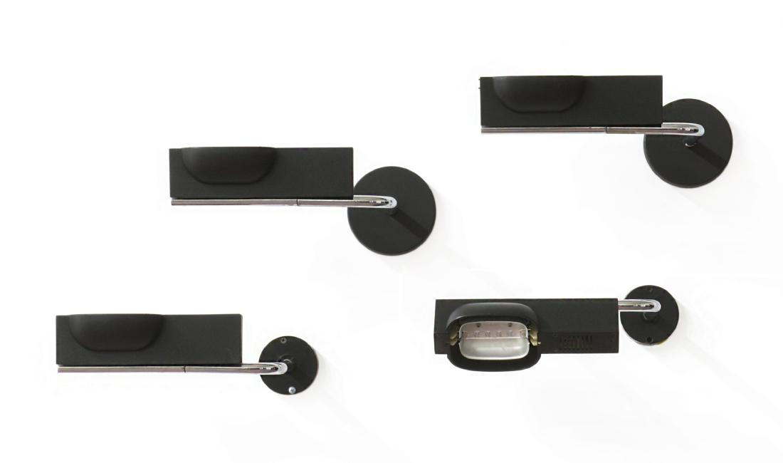 Ernesto Gismondi (1931)* Quattro lampade da parete: Ernesto Gismondi (1931)* Four wall lamps model "Camera". Produced by Artemide, Milan, 1980. Arm in polished chrome and black diffuser. (l 34 cm.) (losses)* Quattro lampade da parete modello "Camera".