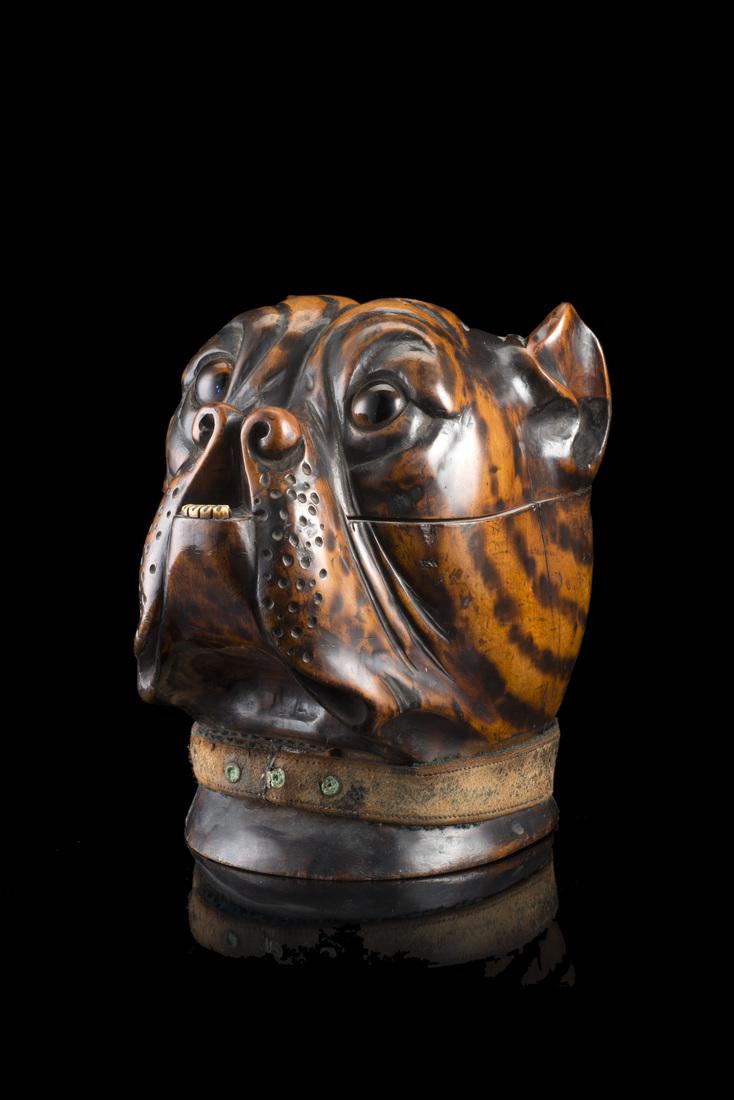 A wooden tobacco box in the shape of a Bulldog's head. (1 of 1)