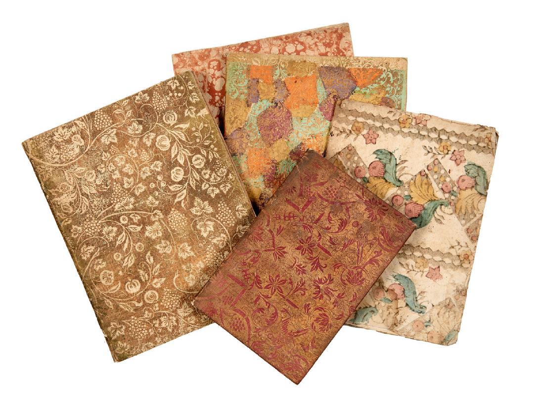 [LEGATURE] Una serie di libri legati in carta (1 of 1)