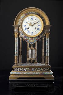 Cloisonné enamel mantel clock, on wood base Second: Cloisonné enamel mantel clock, on wood base Second half 19th century Signed dial with Chinese ideograms "HENG DA LI" Weekly wind movement, strike on gong Enamelled dial with Roman numerals, mercury p