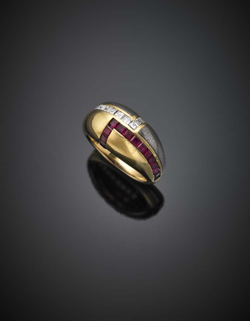 Yellow gold and steel ring accented with carré diamonds: Yellow gold and steel ring accented with carré diamonds and rubies, g 10.17 size 13/53. IT Anello in oro giallo e acciaio con diamanti per complessivi ct. 0,75 circa e rubini per complessivi ct. 0,60