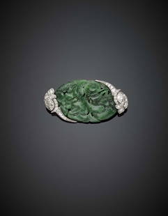 DREICER & CO Carved nephrite and diamond white gold: DREICER & CO Carved nephrite and diamond white gold brooch, in all ct. 0.50 circa, g 14.33, length cm 4.80, width cm 2.50 circa. Signed Dreicer & Co. IT DREICER & CO Broche in oro bianco con nefrite s