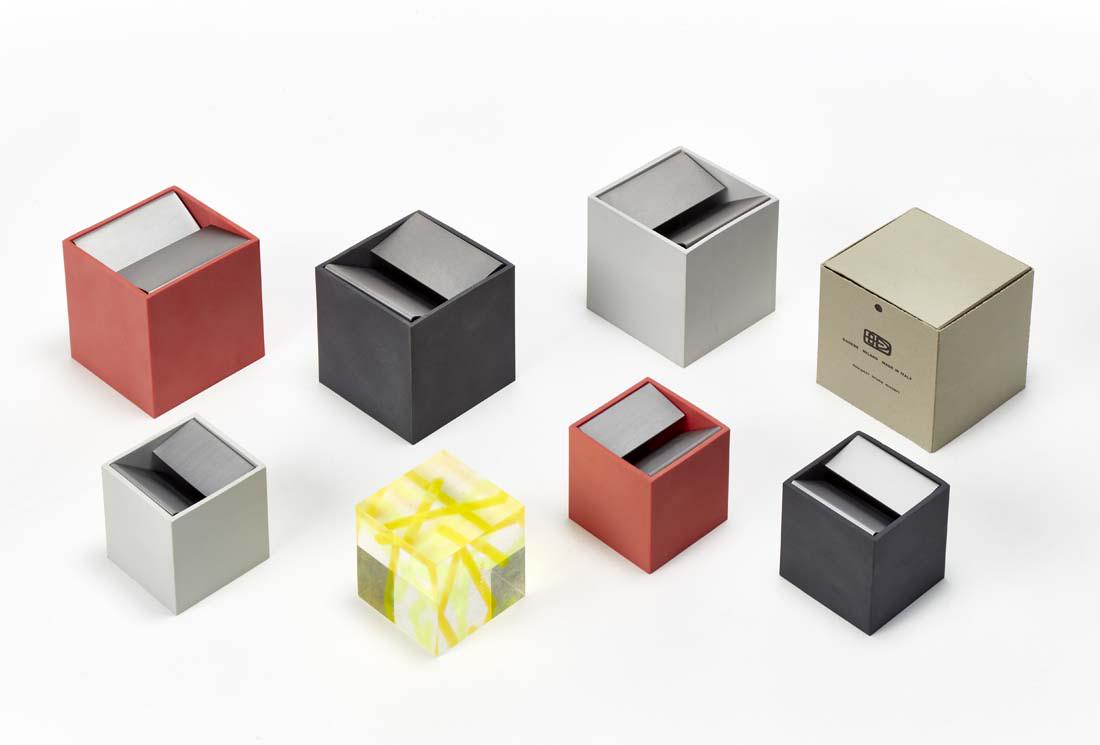 Enzo Mari (Novara 1932) Lot of ten ashtrays and: Enzo Mari (Novara 1932) Lot of ten ashtrays and nineteen small ashtrays, Cubo model, Danese production, Italy 70s, some in original box, combined with a "Piccole forme di vita" cube by James Irvine, p