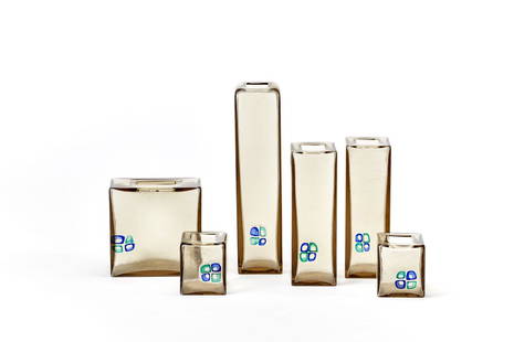 Fulvio Bianconi (Padova 1915 - Milano 1996) Group of: Fulvio Bianconi (Padova 1915 - Milano 1996) Group of six parallelepiped vases of the series "Oh, che bei!". Execution by Luciano Vistosi, Murano, 1960s. Transparent gray glass with polychrome murrine.