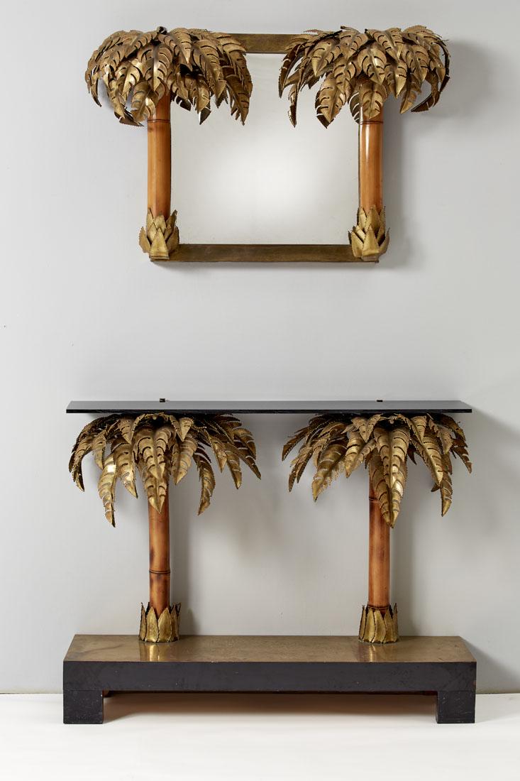 Maison Jansen Palmette console with mirror of similar: Maison Jansen Palmette console with mirror of similar design. France, 1970s. Brass, bamboo, ebonized wood, smoked glass. (console 109.5x84x35.5 cm. mirror 100x 63 cm) (slight defects) IT Consolle a pa
