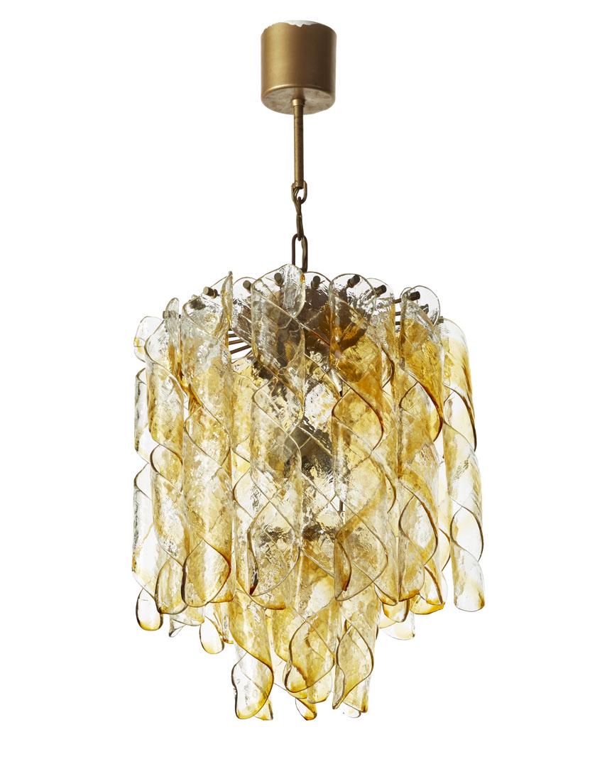 Manifattura di Murano Suspension lamp with two orders: Manifattura di Murano Suspension lamp with two orders of transparent colorless and amber spiral glass pendants, structure in steel and ocher painted metal. Italy, 1970s. (h 80 cm.; d 44 cm.) (slight d