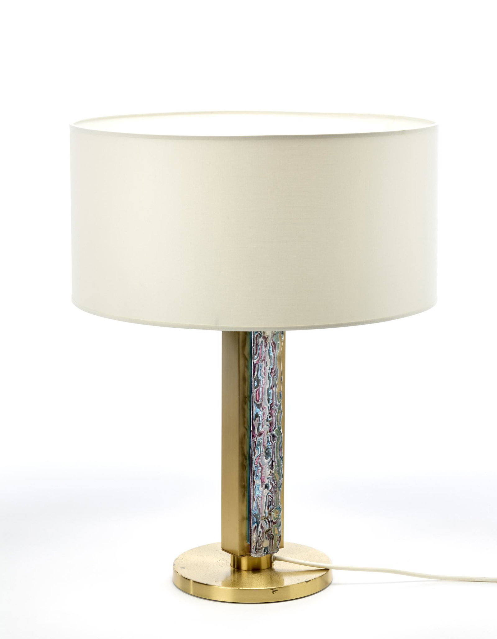 Esperia Table lamp. Poggibonsi, 1970s. Brass: Esperia Table lamp. Poggibonsi, 1970s. Brass structure, polychrome solid glass bands, cream fabric lampshade. Bearing production label. (h without lampshade 42 cm) (slight defects and small losses) IT