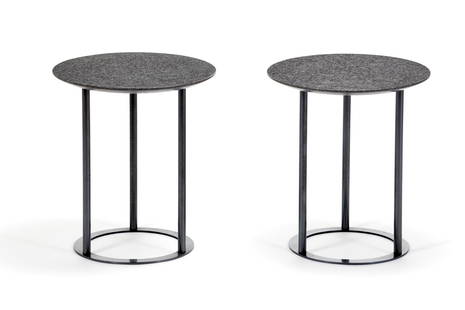 Laura Griziotti Pair of round tables. Produced by: Laura Griziotti Pair of round tables. Produced by Arflex, Italy, 1981. Black painted steel structure, granite top. (h 45.5 cm.; d 40 cm.) (defects and restorations) Literature G. Gramigna, Repertorio