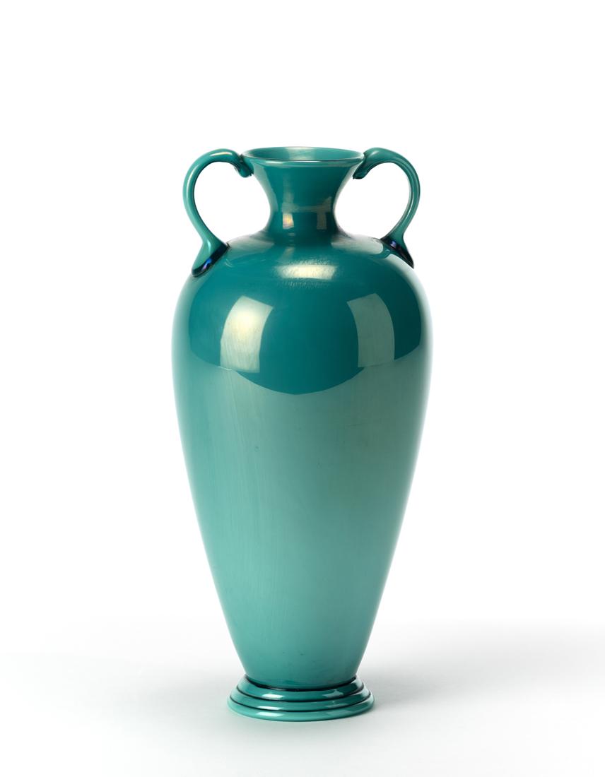 Giuseppe Chiacigh (Wladikawkaz 1895 - Trieste 1967) (Attributed) Baluster-double-handled vase in: Giuseppe Chiacigh (Wladikawkaz 1895 - Trieste 1967) (Attributed) Baluster-double-handled vase in aquamarine incamiciato blown glass. Handles and base with spiral wire loops heat-applied. Execution by