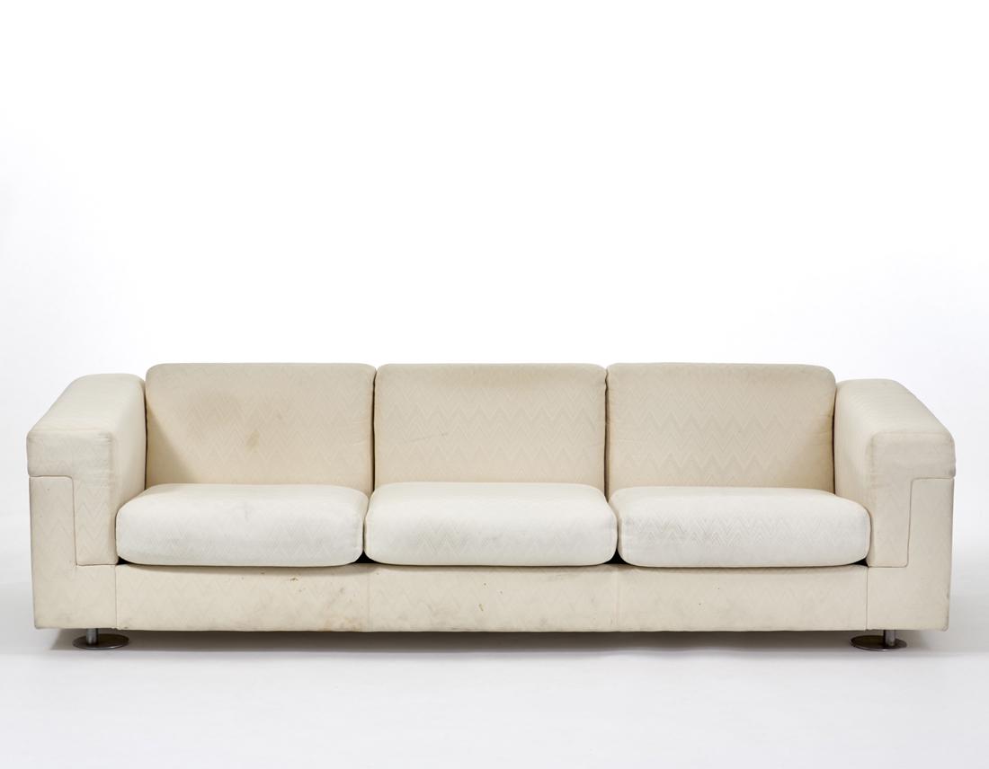 Valeria Borsani e Alfredo Bonetti Three seater sofa model "D120". Produced by Tecno, Varedo, 1966.: Valeria Borsani e Alfredo Bonetti Three seater sofa model "D120". Produced by Tecno, Varedo, 1966. Upholstery in cream fabric, feet in chromed steel. (221x58x81 cm.) (slight defects and restoration) L
