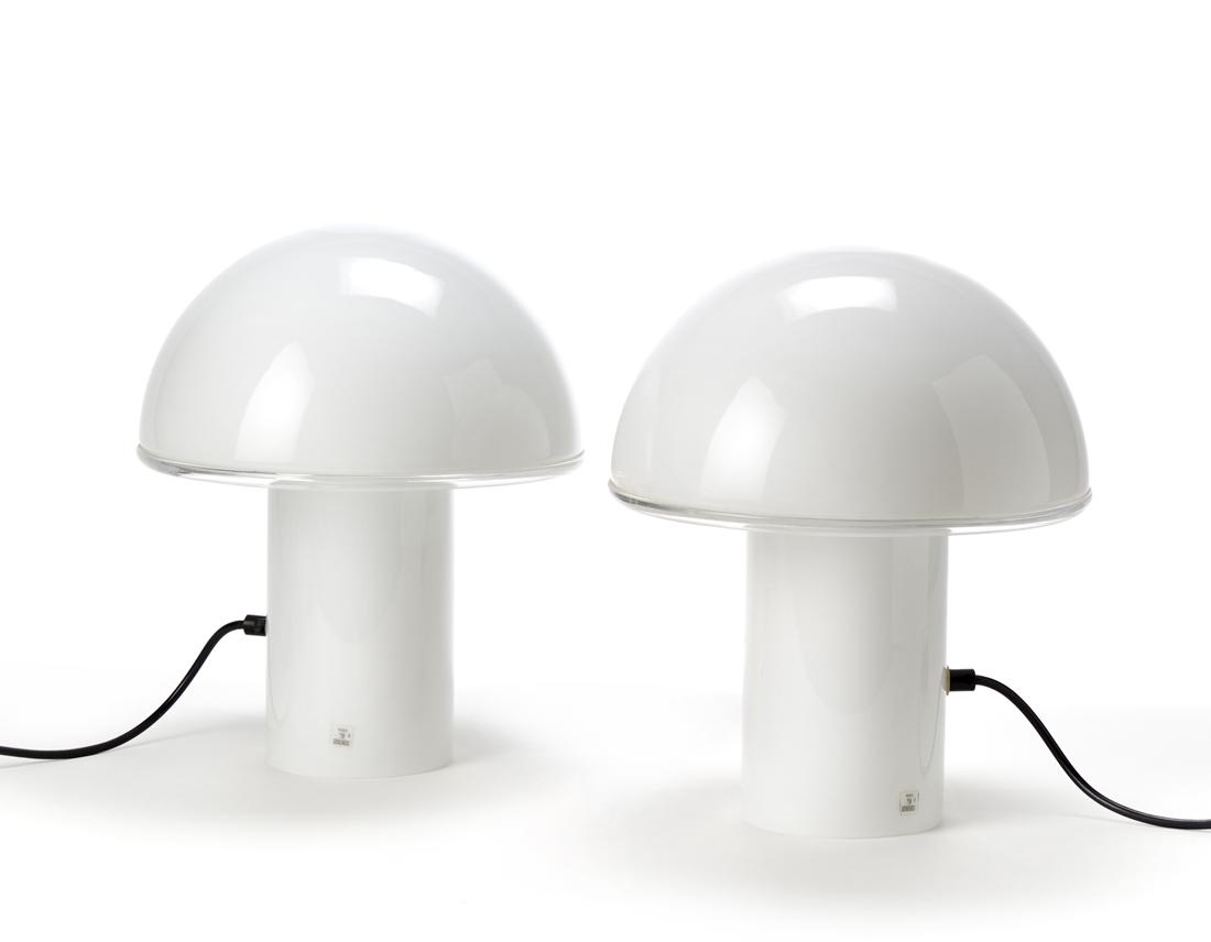 Luciano Vistosi (Murano 1931 - Venezia 2010) Pair of table lamps model "Onfale". Produced by: Luciano Vistosi (Murano 1931 - Venezia 2010) Pair of table lamps model "Onfale". Produced by Artemide, Milan, 1978. Transparent colorless and lattimo glass. With manufacturer's label. (h 35 cm.) Liter