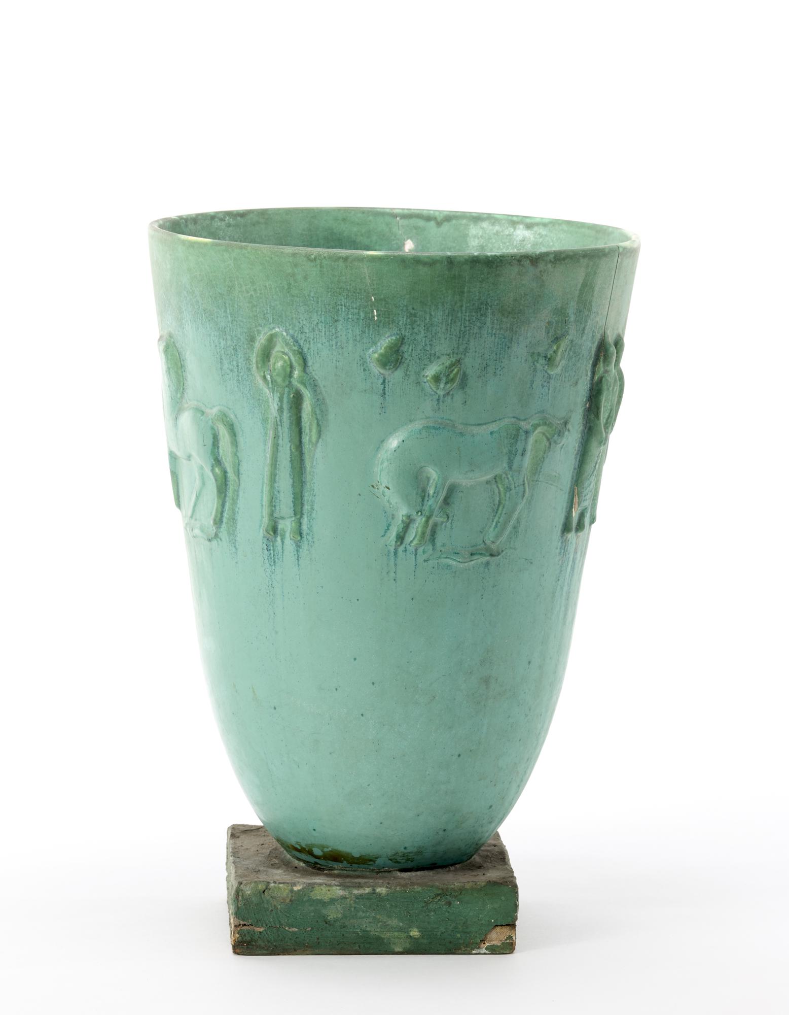 Angelo Biancini (Castel Bolognese 1911 - Castel Bolognese 1988) Large vase decorated with horses and: Angelo Biancini (Castel Bolognese 1911 - Castel Bolognese 1988) Large vase decorated with horses and human figures. Manufacture of SocietÃ Ceramica Italiana, Laveno, 1930s. Green glazed cast cerami