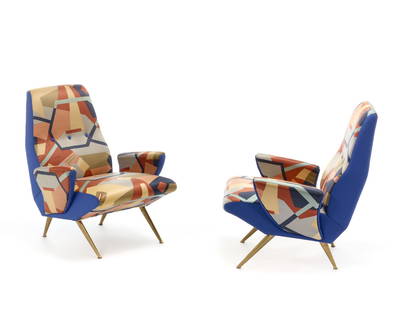 Pair of armchairs upholstered in blue fabric and polychrome printed fabric with an abstract subject: Pair of armchairs upholstered in blue fabric and polychrome printed fabric with an abstract subject signed by Mauro Reggiani. Truncated conical legs in brass-plated metal casting. Italy, 1950s/1960s.