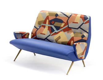 Two seater sofa upholstered in blue fabric and polychrome printed fabric with an abstract subject