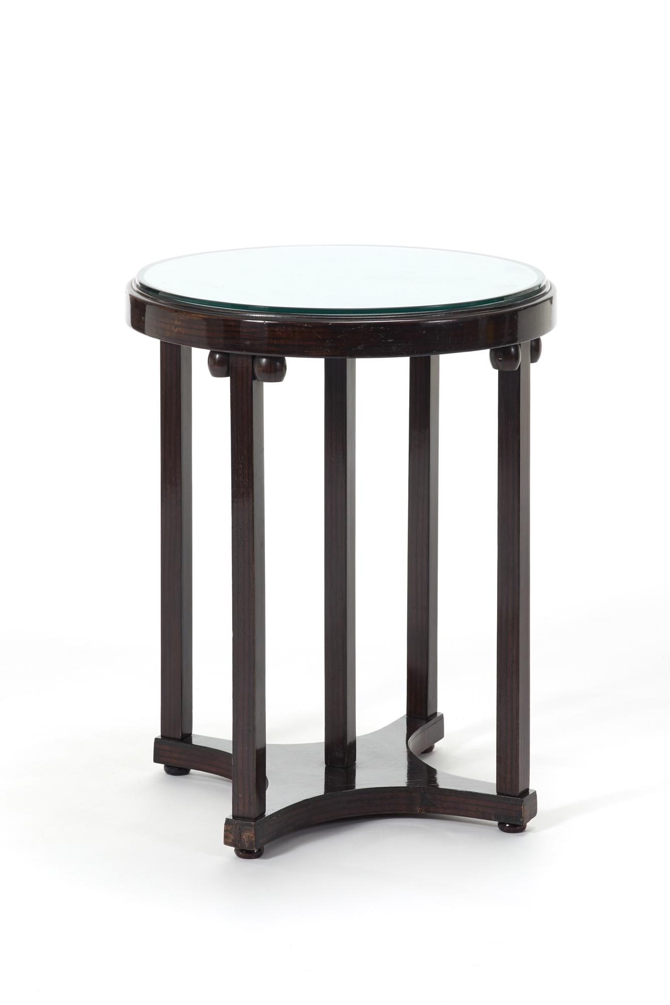 Jacob & Josef Kohn  Coffee table with circular top, pillar legs connected at the base and spherical (1 of 1)