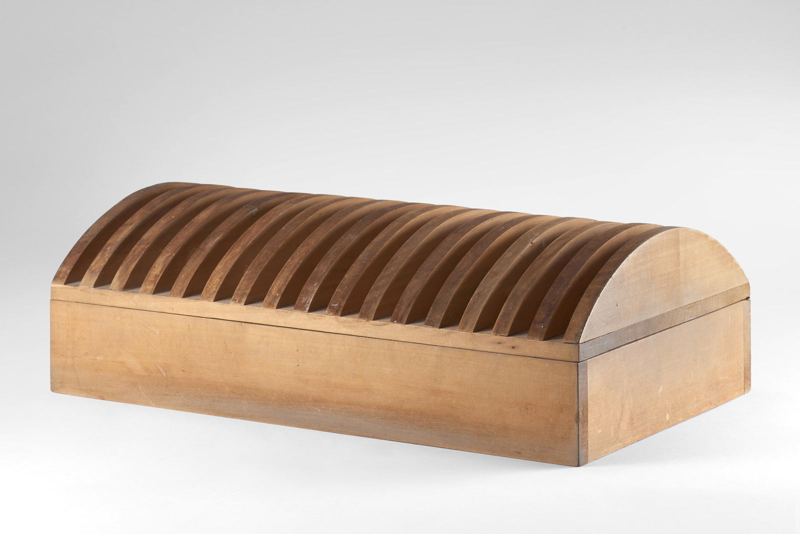 Mario Ceroli (Castel Frentano 1938) Jewellery box with separable inner containers. Produced by: Mario Ceroli (Castel Frentano 1938) Jewellery box with separable inner containers. Produced by Poltronova, 1970s. Raw pine wood. (35x11x21 cm.) (slight defects and losses) Special edition for Fiat IT