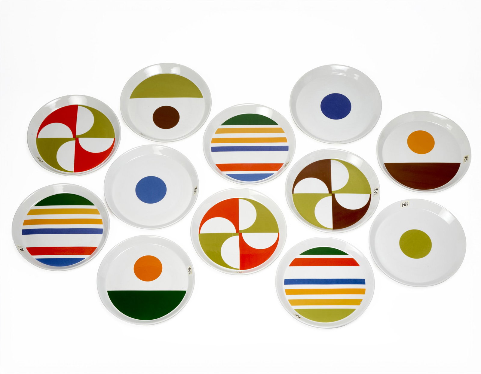 Gio Ponti (Milano 1891 - Milano 1979) Twelve plates of the series "Fantasia Italiana". Execution by: Gio Ponti (Milano 1891 - Milano 1979) Twelve plates of the series "Fantasia Italiana". Execution by Ceramiche Franco Pozzi, Italy, 1960s. White porcelain with polychrome geometric decorations. Signed