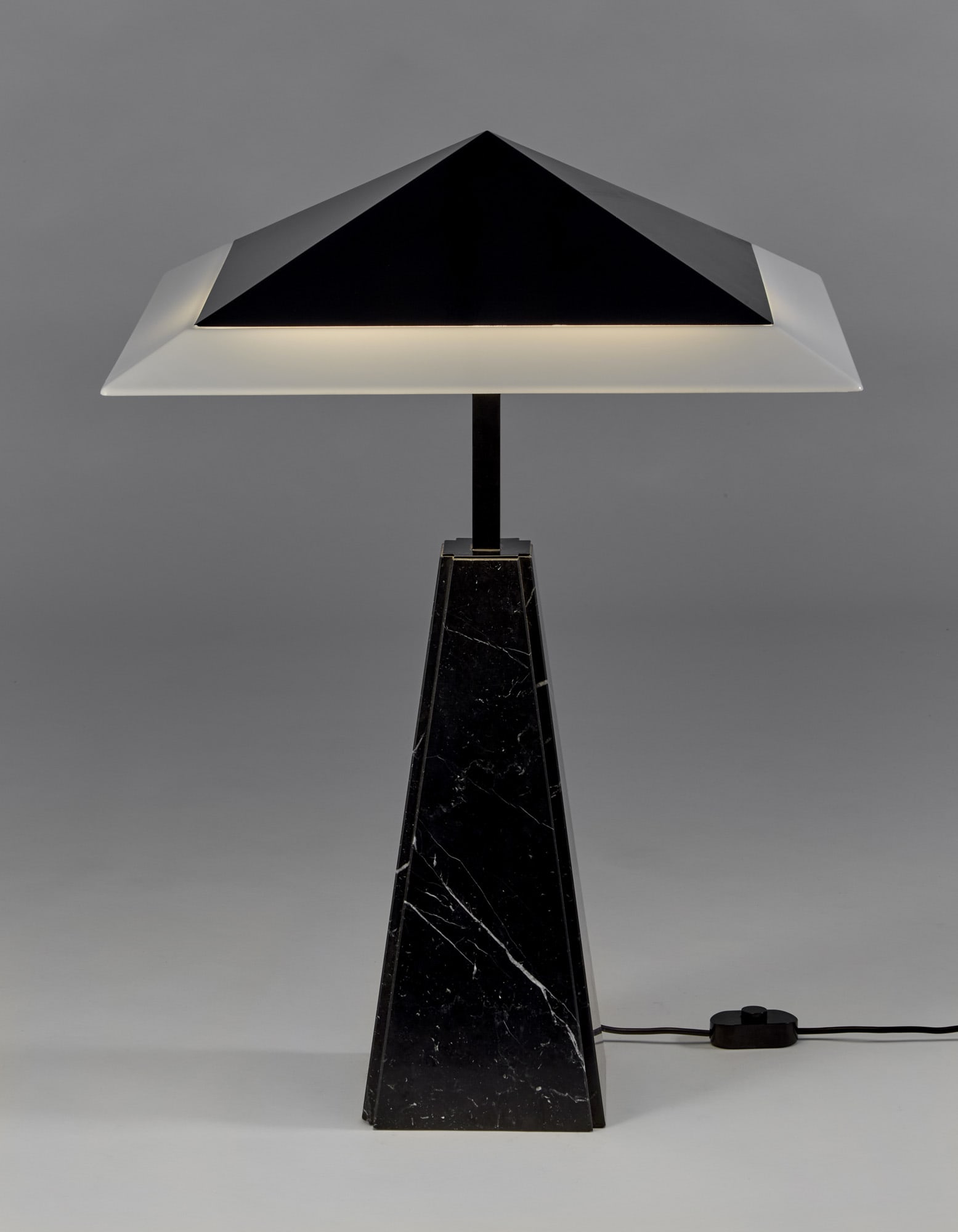 Cini Boeri (Milano 1924 - Milano 2020) Table lamp model "Abat Jour". Produced by ArteLuce, Milan,: Cini Boeri (Milano 1924 - Milano 2020) Table lamp model "Abat Jour". Produced by ArteLuce, Milan, 1975. Black marble, black metal and white methacrylate. (64x86 cm.) (slight defects) Literature Giulia