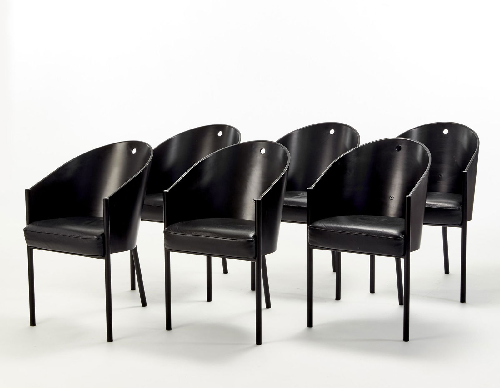 Philippe Starck (Parigi 1949) Six chairs model "Costes". Produced by Driade,, 1984. Black painted: Philippe Starck (Parigi 1949) Six chairs model "Costes". Produced by Driade, 1984. Black painted tubular steel frame, black lacquered plywood shell. Seat with polyurethane foam padding and fixed leath
